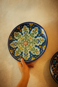 "Handcrafted 8-inch blue pottery plate with floral design from Rajasthan India"